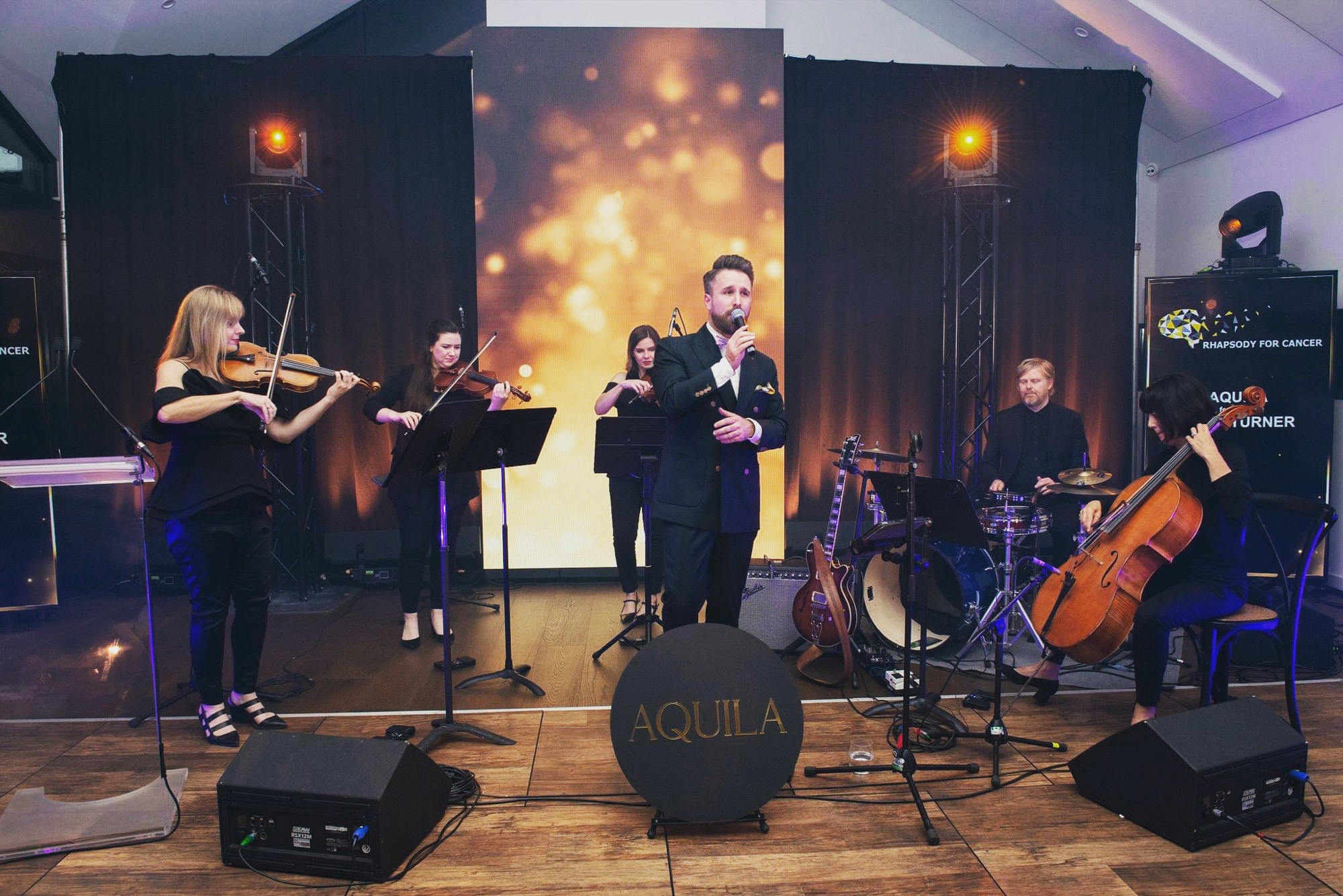 Aquila live feature performance with singer